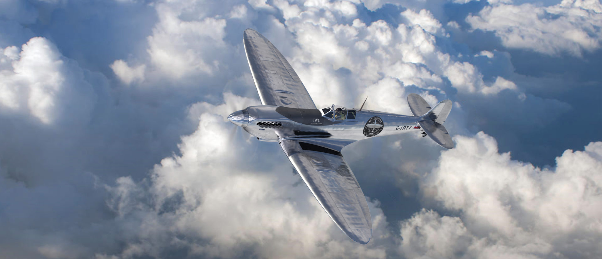 Silver Spitfire in mid flight